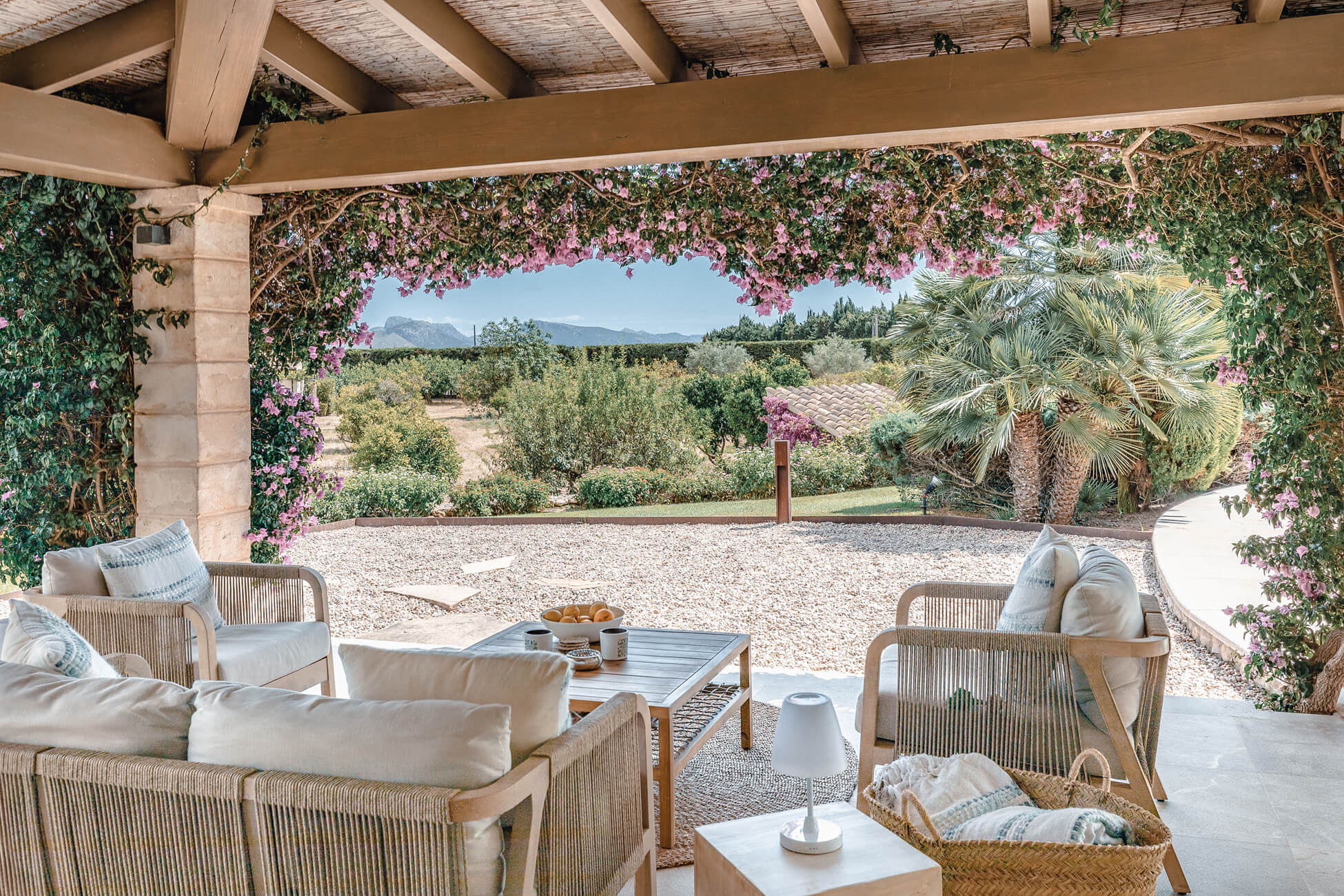 Lounge area under flowers with a great view